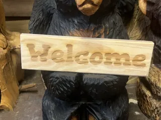 Sign holder bear