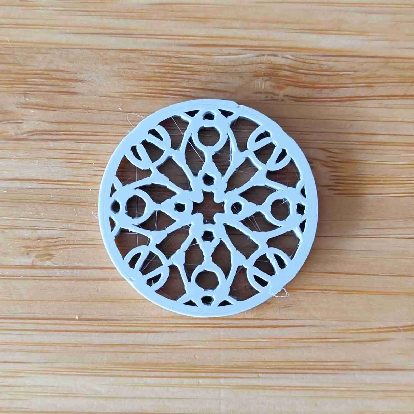 Ornamental shirt or blouse button - flower ornament
