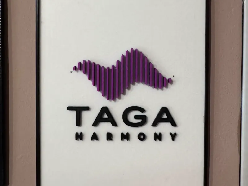 Taga Harmony logo board