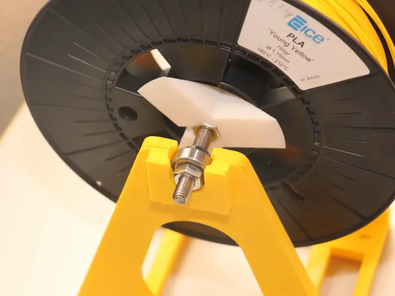 Suport pentru filament pentru adaptorul de bobină final
