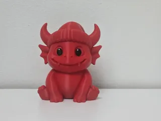 Horned Monster with Hat Christmas Figurine