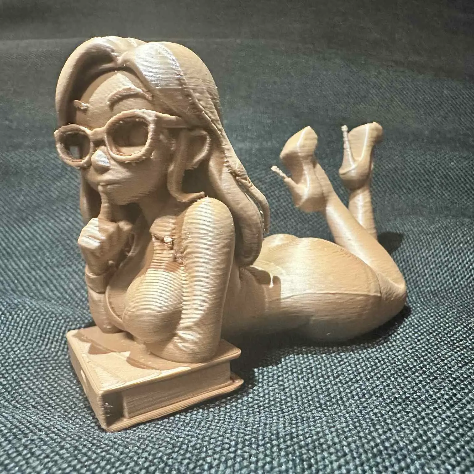 Anime Busty Teacher with Glasses Lying on a Book Figurine