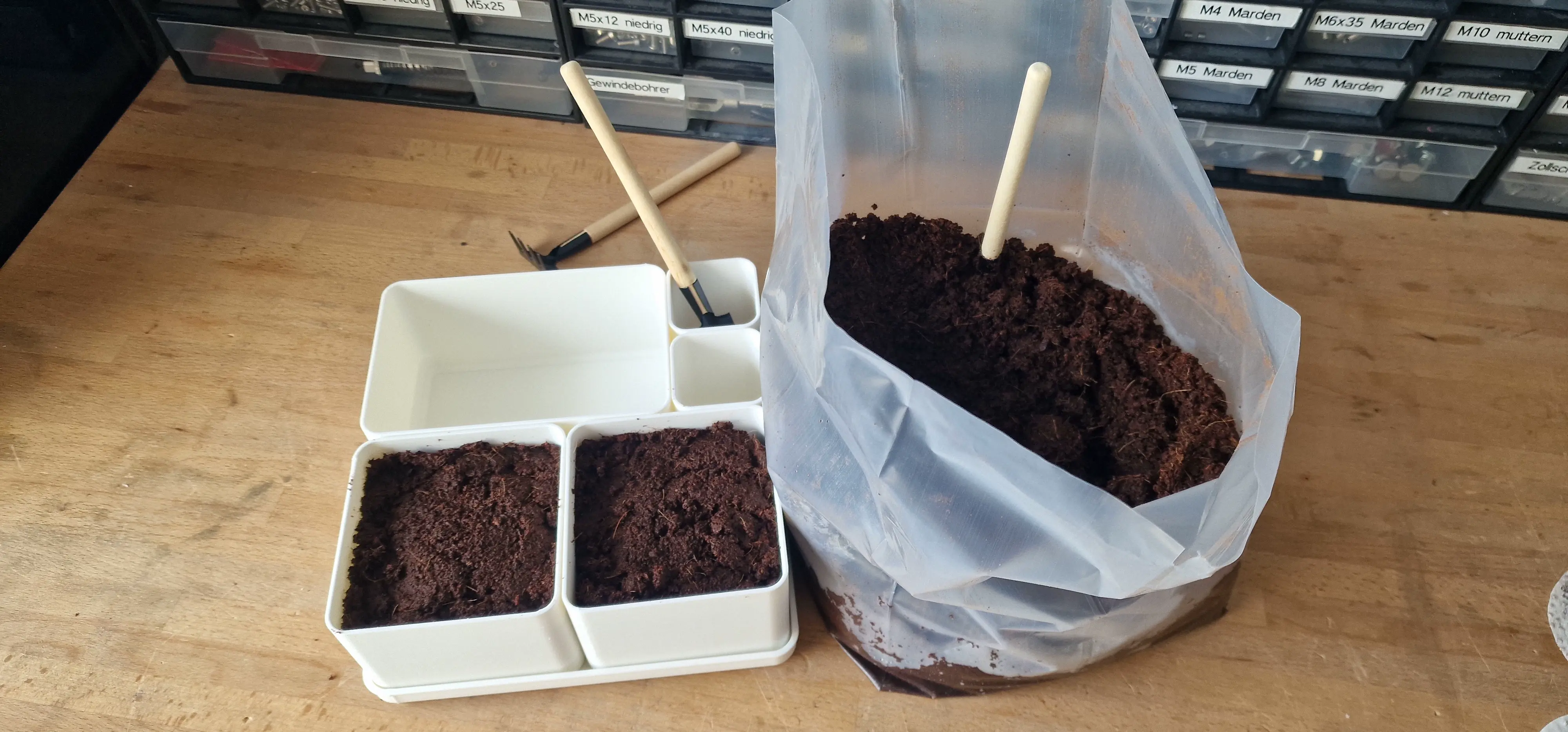 a simple flexible plant growing station for the home garden