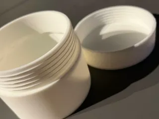 Container with screw on lid