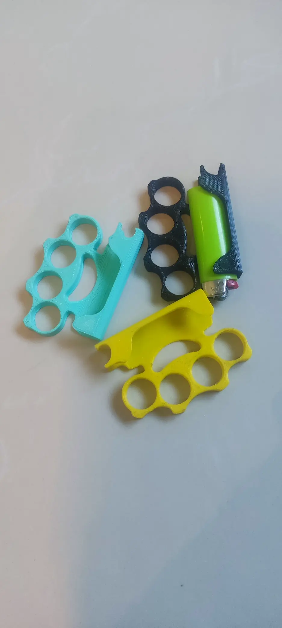 Multifunctional brass knuckles.