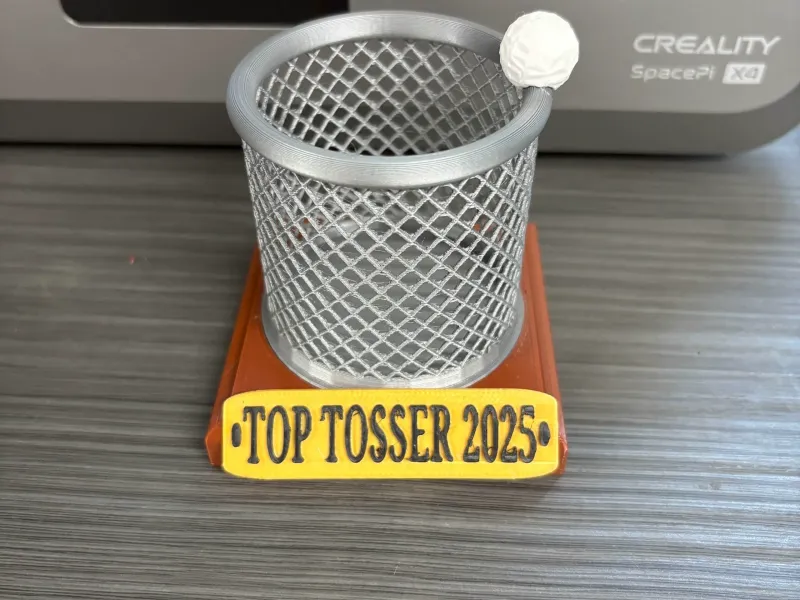 Paper Toss Champion Trophy