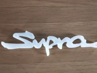 логотип toyota supra