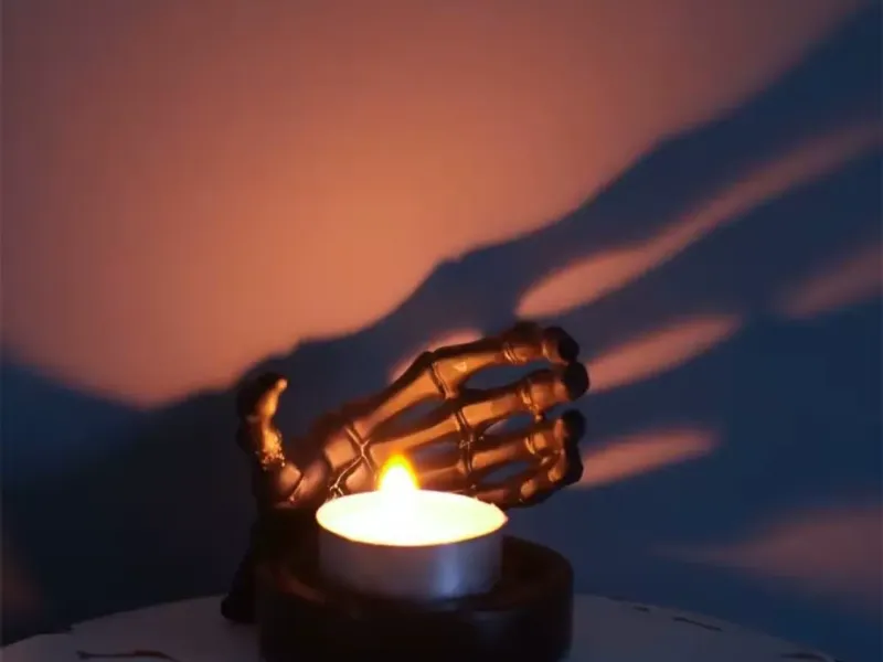 skeleton hand candle holder