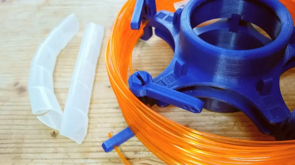 Ontgrendelbare spoel voor los filament