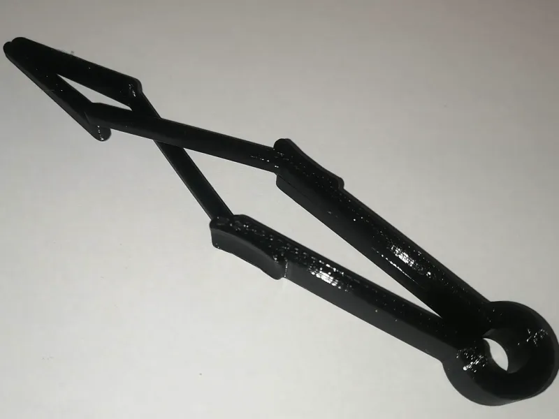 Cross Tweezers: One-Piece