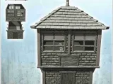 Edificio rectangular de ladrillo de dos plantas con tejado de pizarra y wo-1