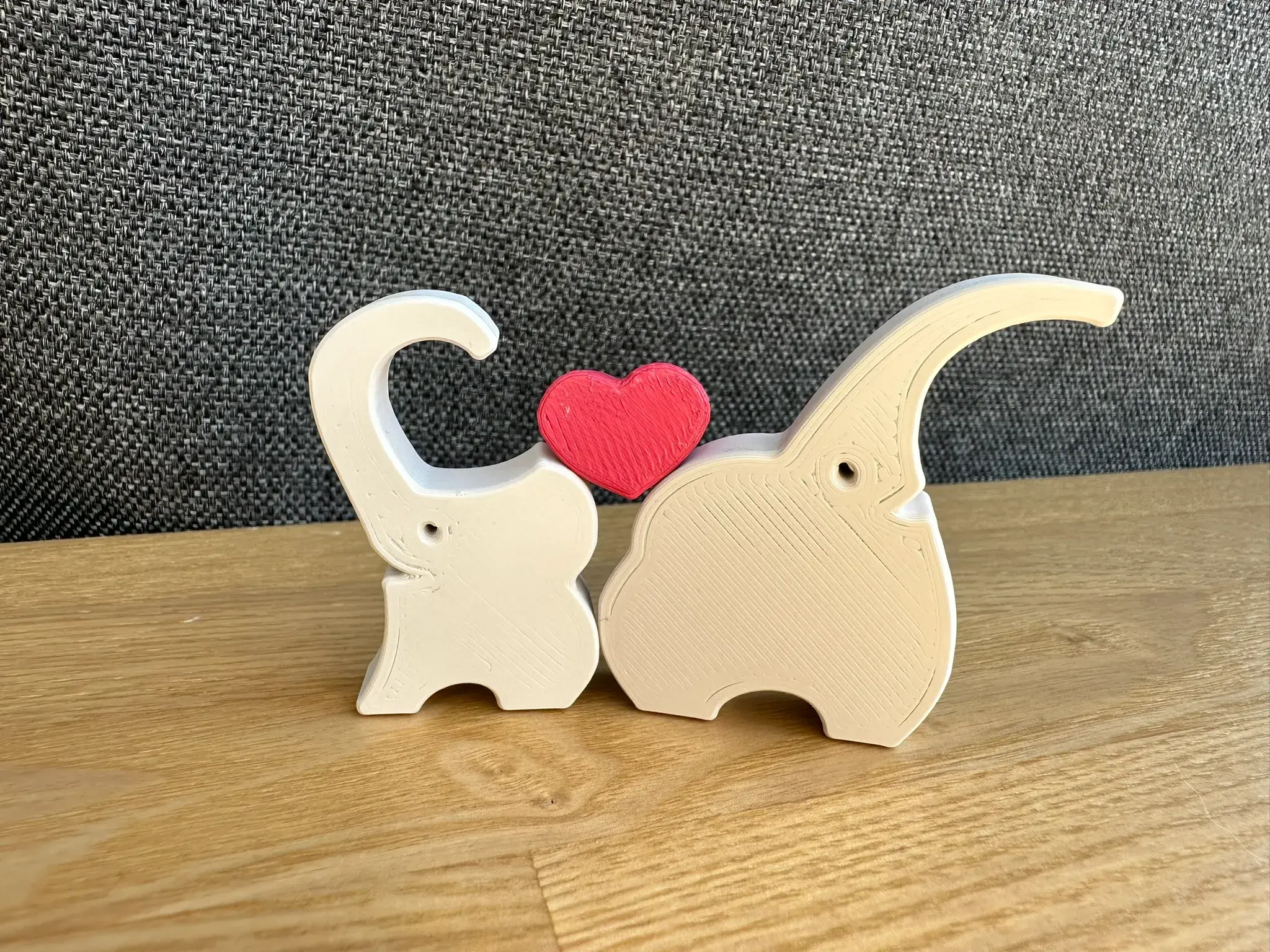 Moederolifant en babyolifant met hart