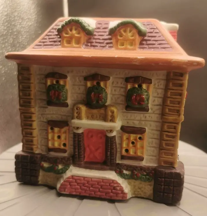 casa de pueblo de navidad con huecos para luces