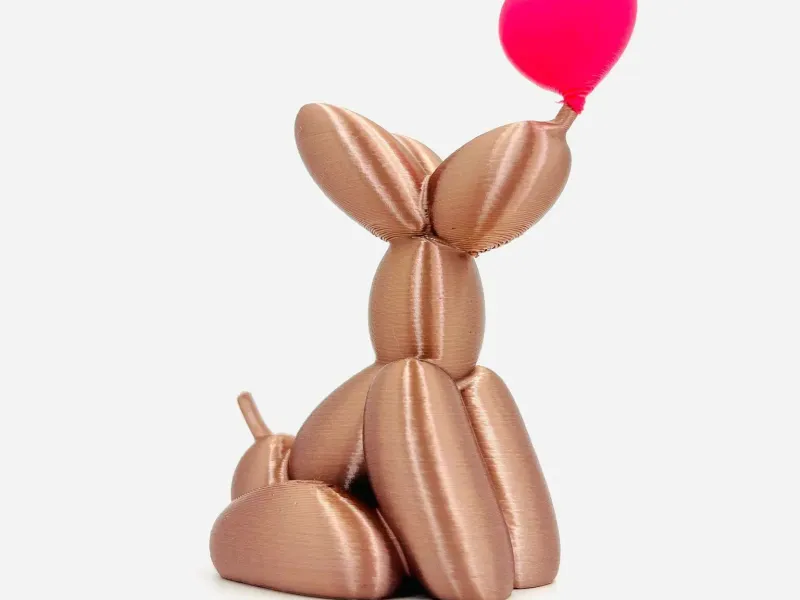 Balloon dog with heart decor