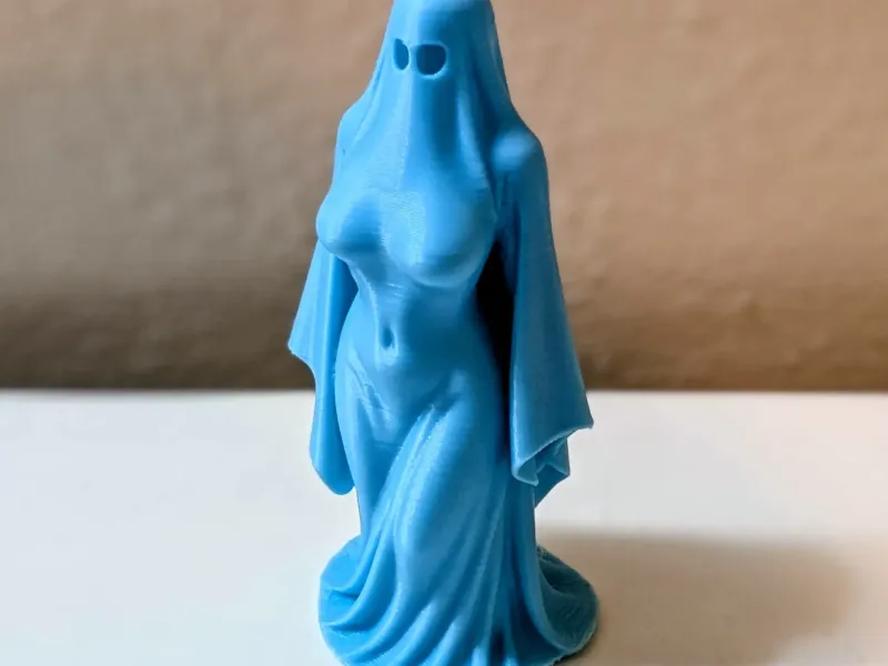 Haunting Elegance – Ghost Lady Figurine