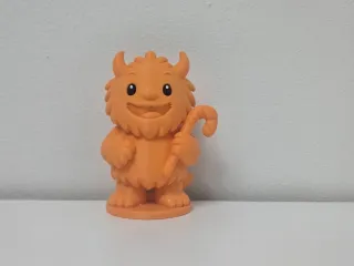 Furry Monster with Candy Cane Christmas Figure
