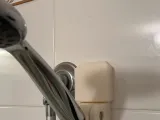 I use this to go over screws that hold a shower head-0