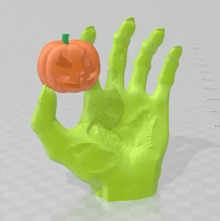a zombie hand catches pumpkin