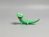 Tom Lizard waving hand-1