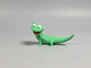 Tom Lizard waving hand