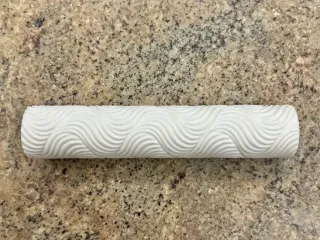 Wavy pattern roller