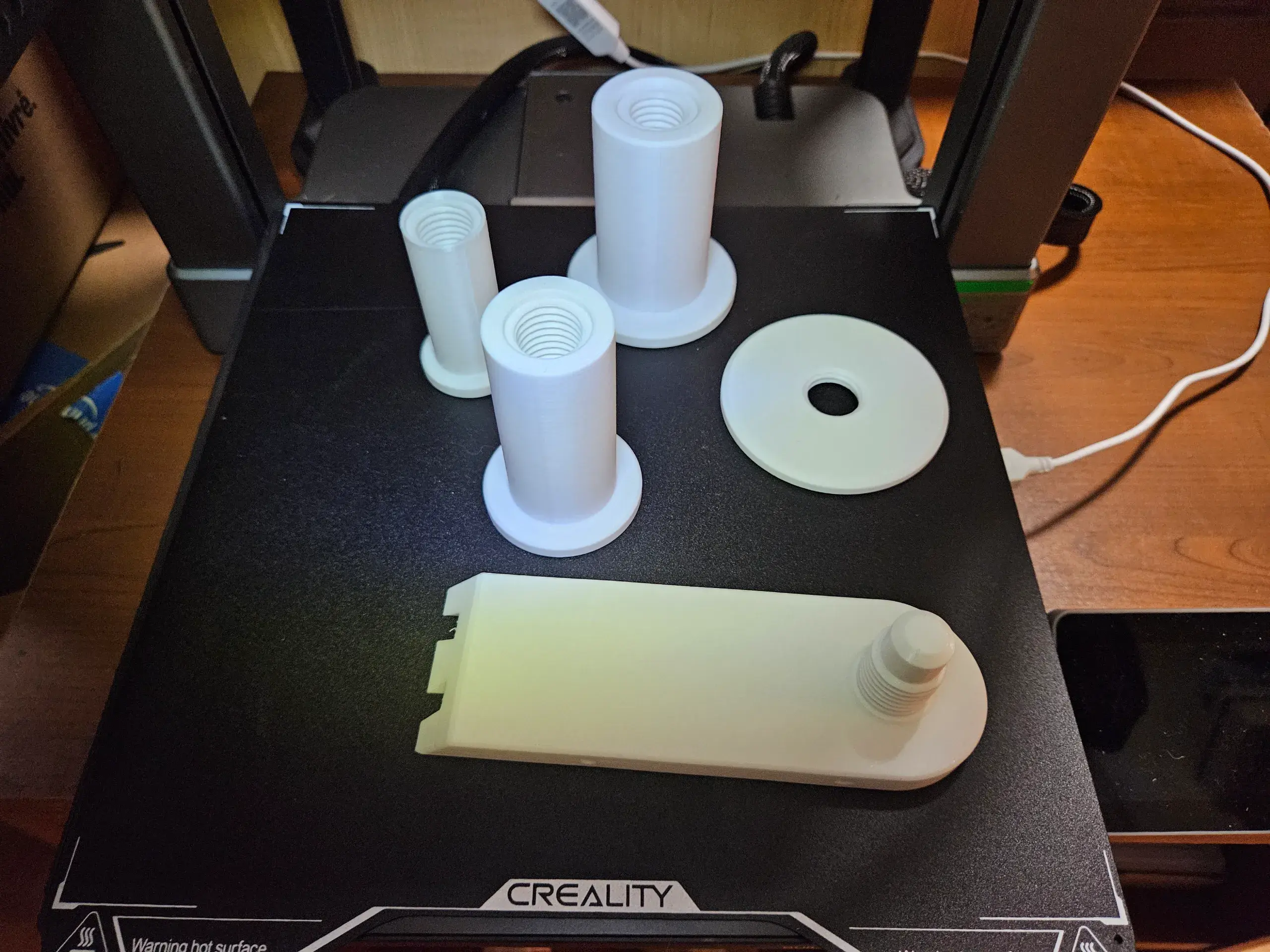 Interchangeable rear spool holder for CFS Hi overhead