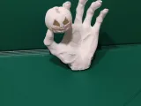 a zombie hand catches pumpkin-0