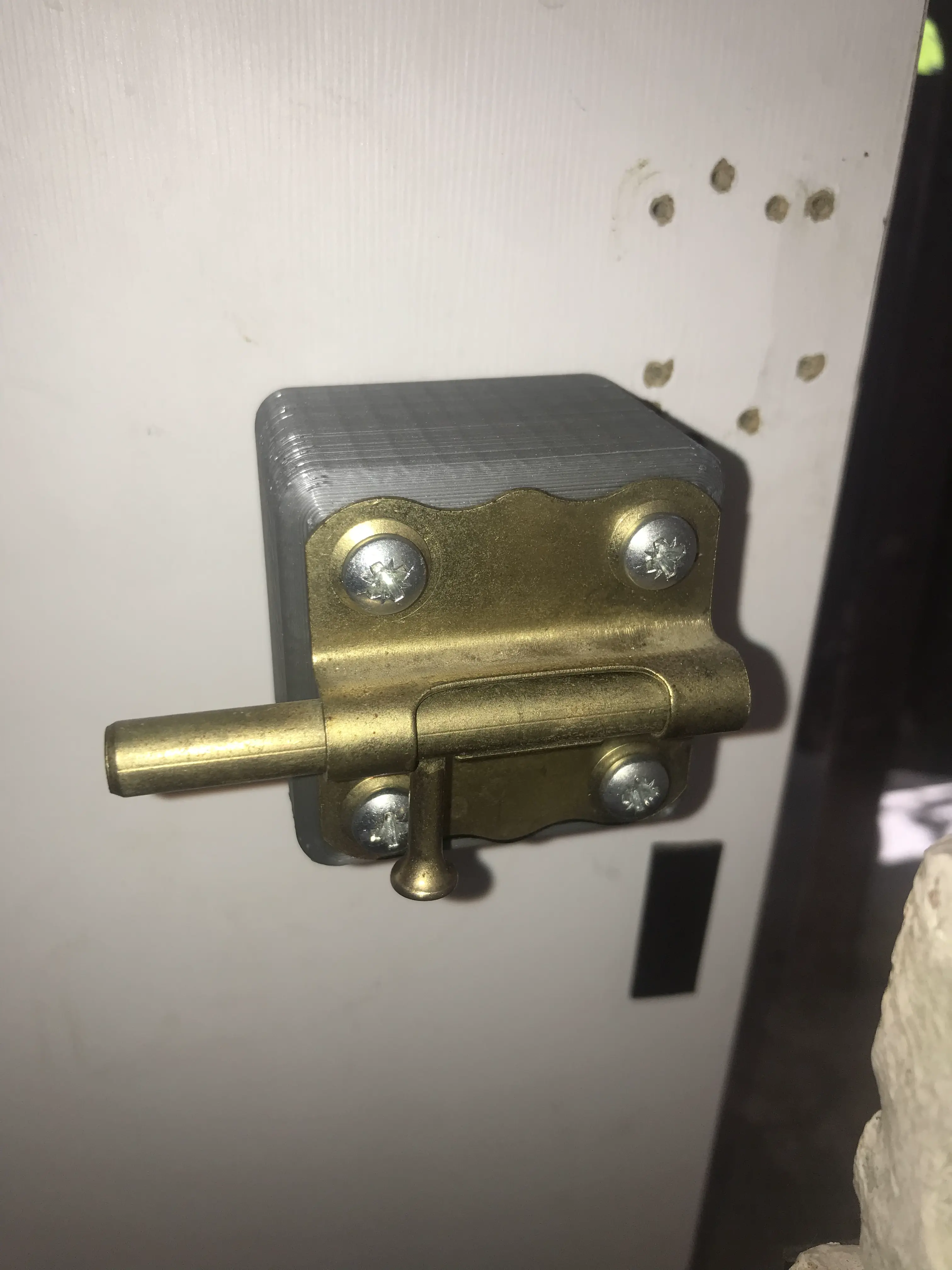 Door Latch Positioner