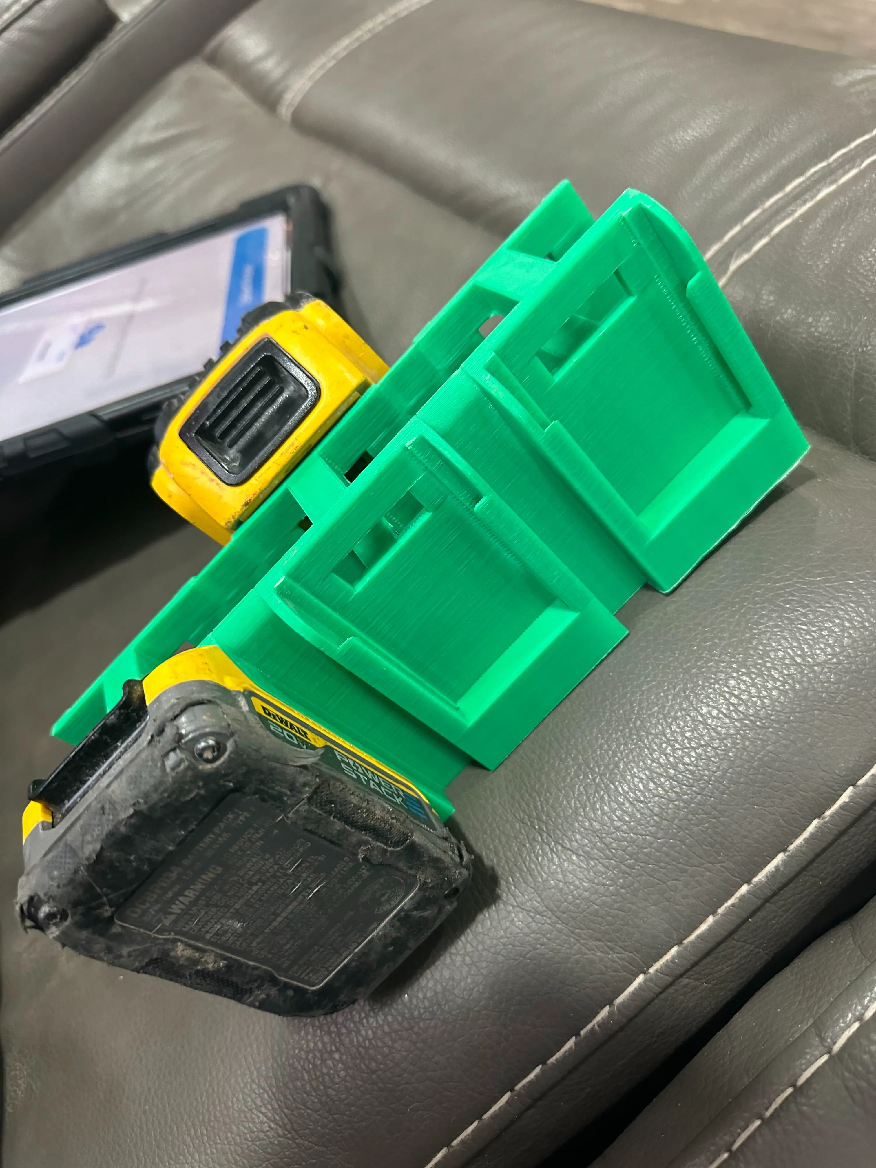 battery holder compatible with Dewalt batteries.