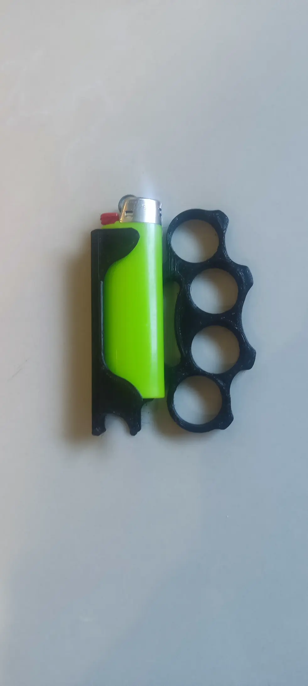 Multifunctional brass knuckles.