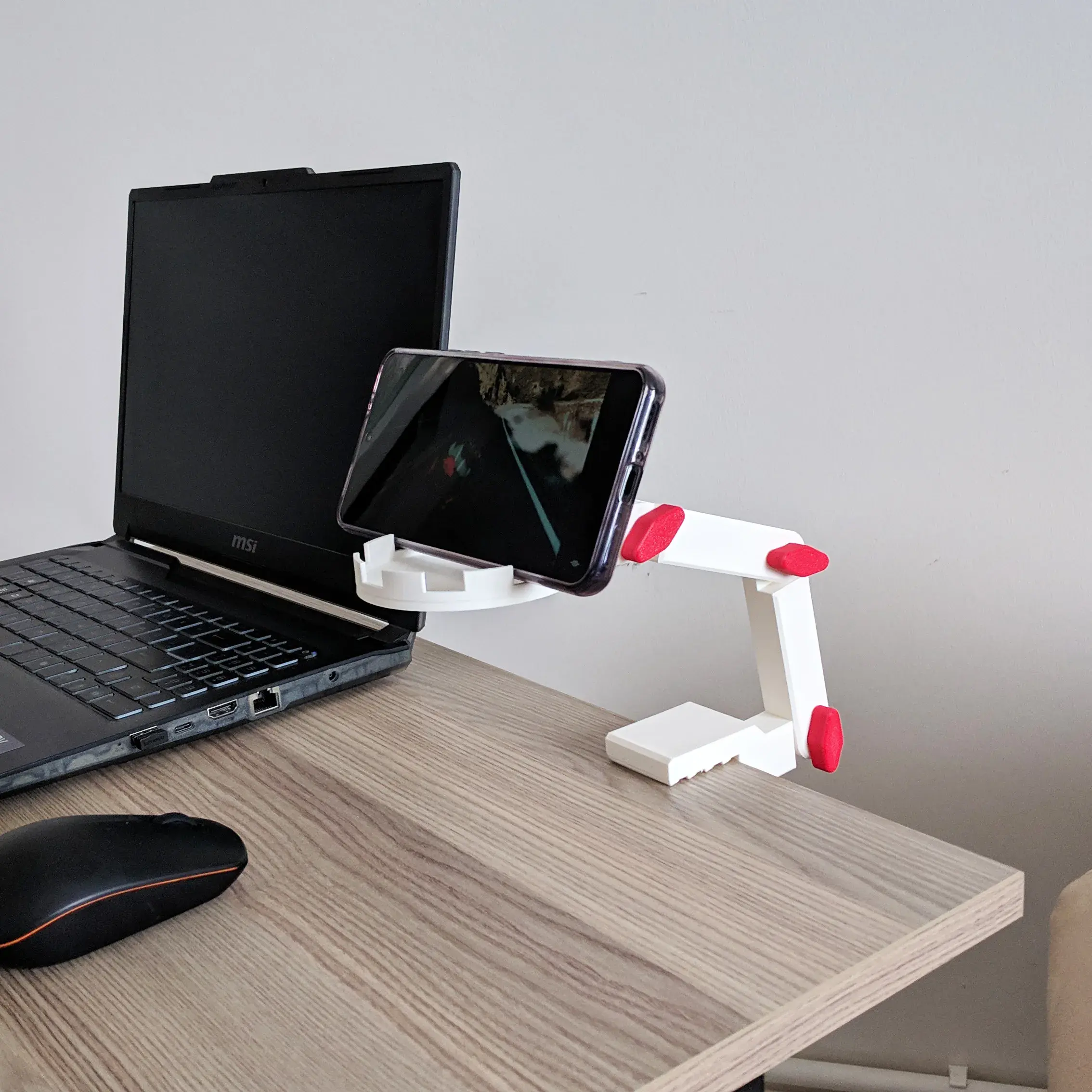 ADJUSTABLE CAMERA HOLDER