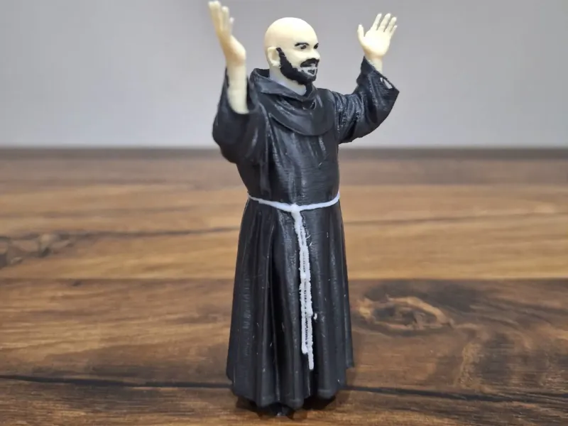 Figurine of a Priest