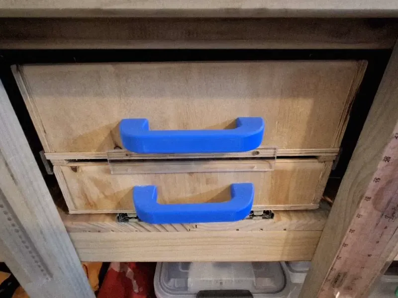 Handle for drawers or cupboards 