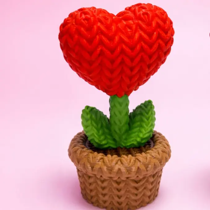 Knitted heart flower