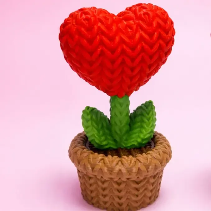 Knitted heart flower