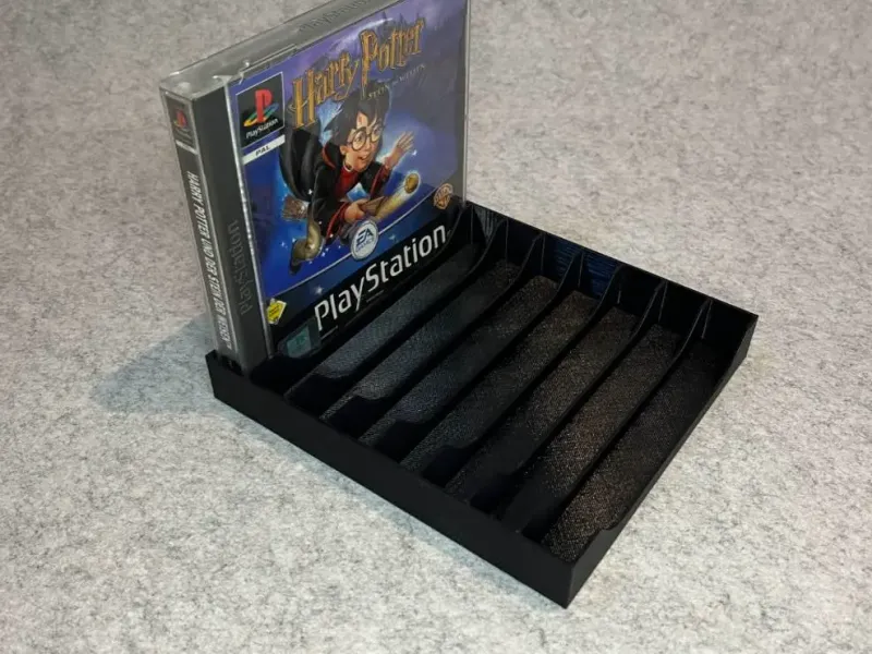 Games stand holder for PlayStation One (PSX, One)