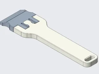 Scraper with interchangeable blade