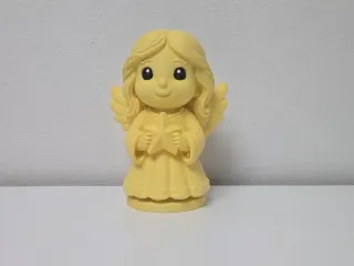 Smiling Angel with Star Christmas Figurine