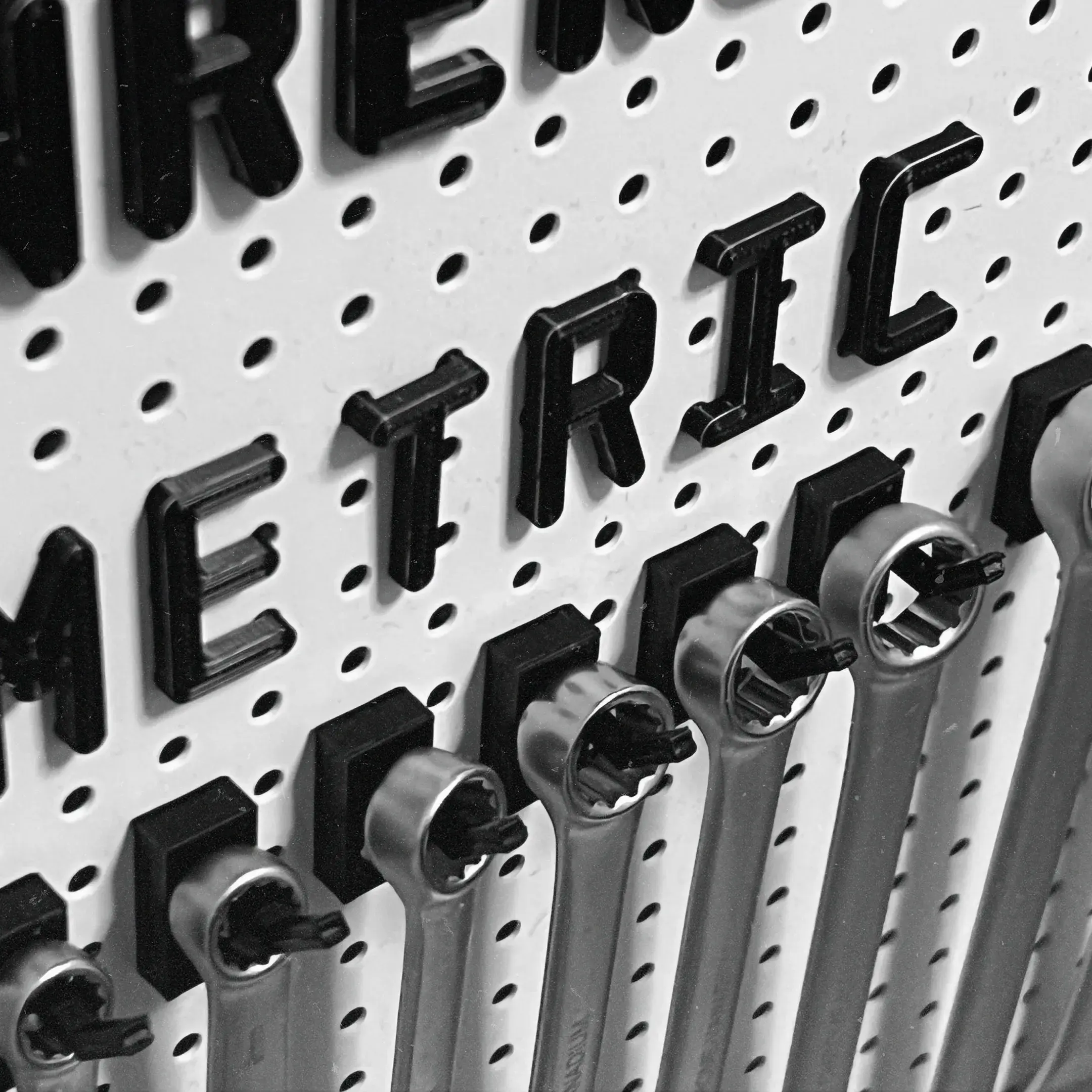 Pegboard kit (Biltema) - Monopeg Rounded typeface
