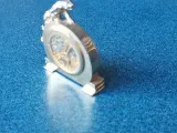 golden clock with 7750-7