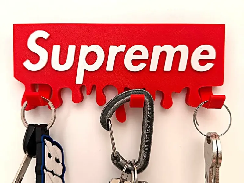 Chaveiro com placa do logotipo Supreme