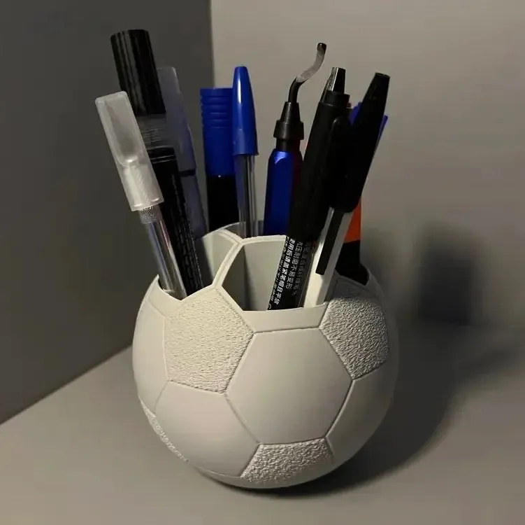 Penhouder in de vorm van een bal. Balvormige penhouder