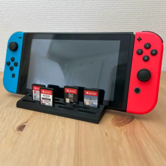 Stand for Nintendo Switch and 11 game cartridges