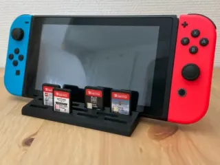 Stand for Nintendo Switch and 11 game cartridges