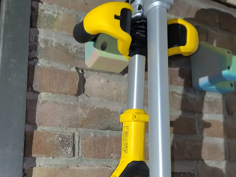 Grass cutter wall mount