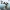 Dragón cornudo sobre promontorio rocoso - figura estatua miniatura