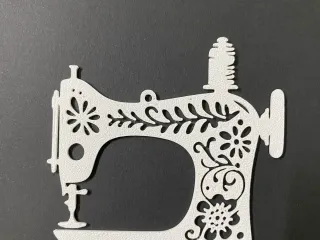 Sewing machine ornament