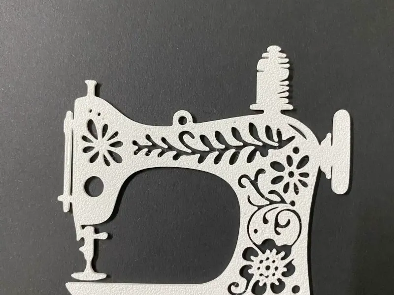 Sewing machine ornament