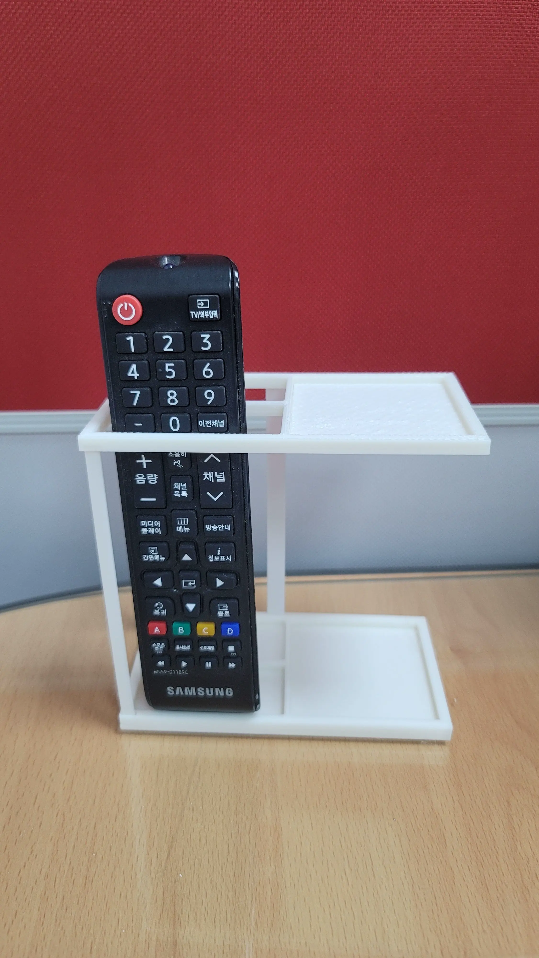 Two-layer remote control Holder