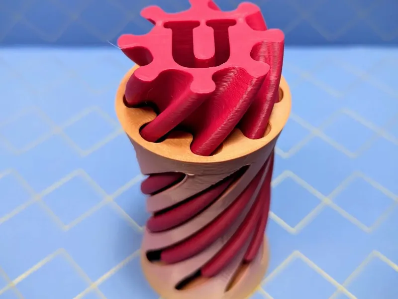 Fidget Vórtice Espiral Letra U - Juguete Pasante 180°